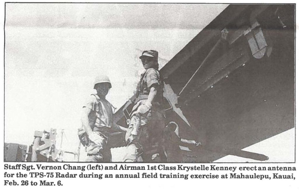 Staff Sgt. Vernon Chang (left) and Airman 1st Class Krystelle Kenney erect an antenna for the TPS-75 Radar during an annual field training exercise at Mahaulepu, Kauai, Feb. 26 to Mar. 6.