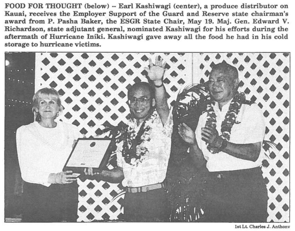 FOOD FOR THOUGHT (below) -- Earl Kashiwagi (center), a produce distributor on Kauai, receives the Employer Support of the Guard and Reserve state chairman's award from P. Pasha Baker, the ESGR State Chair, May 19. Maj. Gen. Edward V. Richardson, state adjutant general, nominated Kashiwagi for his efforts during the aftermath of Hurricane Iniki. Kashiwagi gave away all the food he had in his cold storage to hurricane victims.