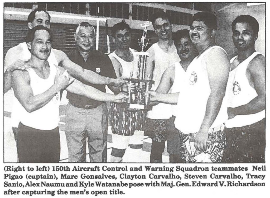(Right to left) 150th Aircraft Control and Warning Squadron teammates Neil Pigao (captain), Marc Gonsalves, Clayton Carvalho, Steven Carvalho, Tracy Sanio, Alex Naumu and Kyle Watanabe pose with Maj. Gen. Edward V. Richardson after capturing the men's open title.
