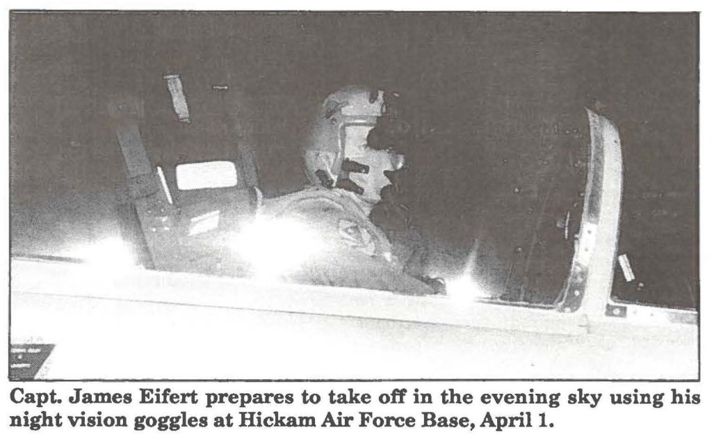 Capt. James Eifert prepares to take off in the evening sky using his night vision goggles at Hickam Air Force Base, April 1.