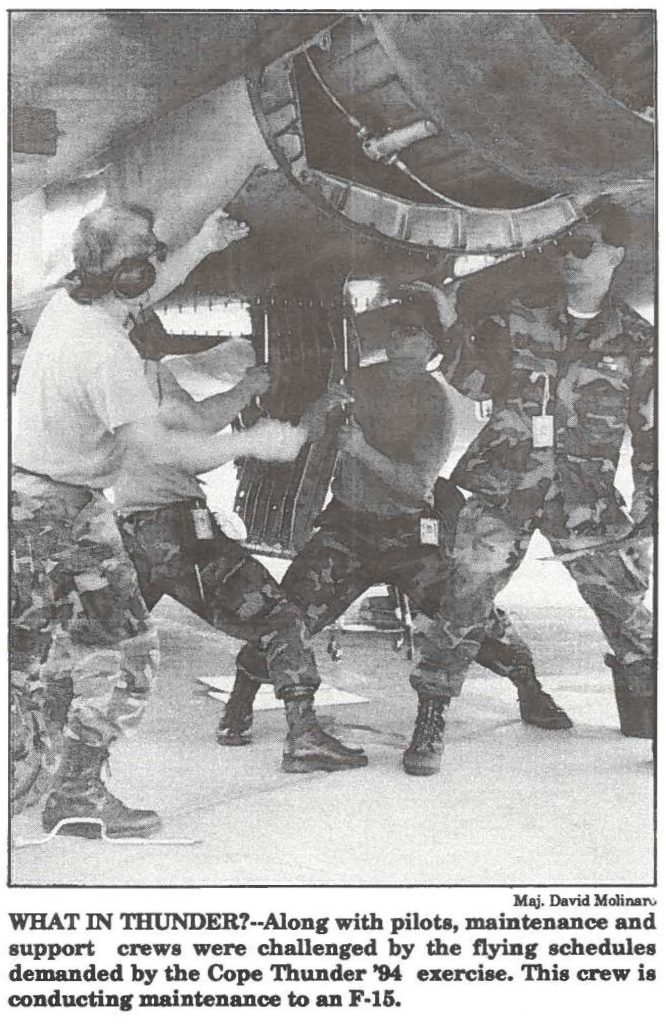 WHAT IN THUNDER?--Along with pilots, maintenance and support crews were challenged by the flying schedules demanded by the Cope Thunder '94 exercise. This crew is conducting maintenance to an F-15.