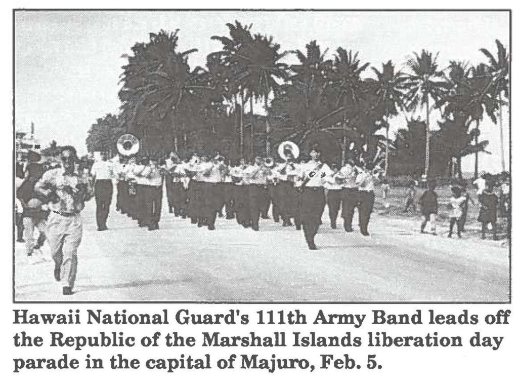Hawaii National Guard's 111th Army Band leads off the Republic of the Marshall Islands liberation day parade in the capital of Majuro, Feb. 5.