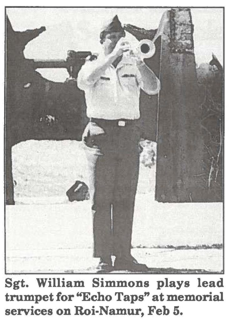 Sgt. William Simmons plays lead trumpet for "Echo Taps" at memorial services on Roi-Namur, Feb 5.