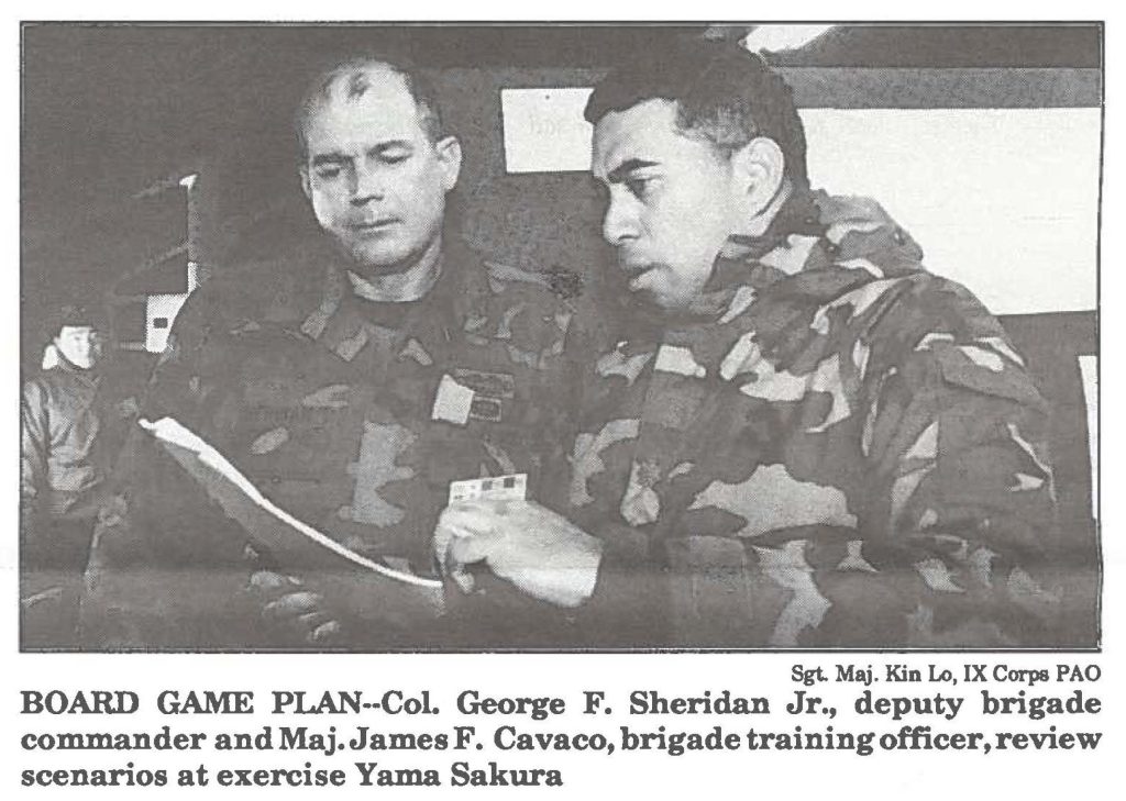 BOARD GAME PLAN--Col. George F. Sheridan Jr., deputy brigade commander and Maj. James F. Cavaco, brigade training officer, review scenarios at exercise Yama Sakura