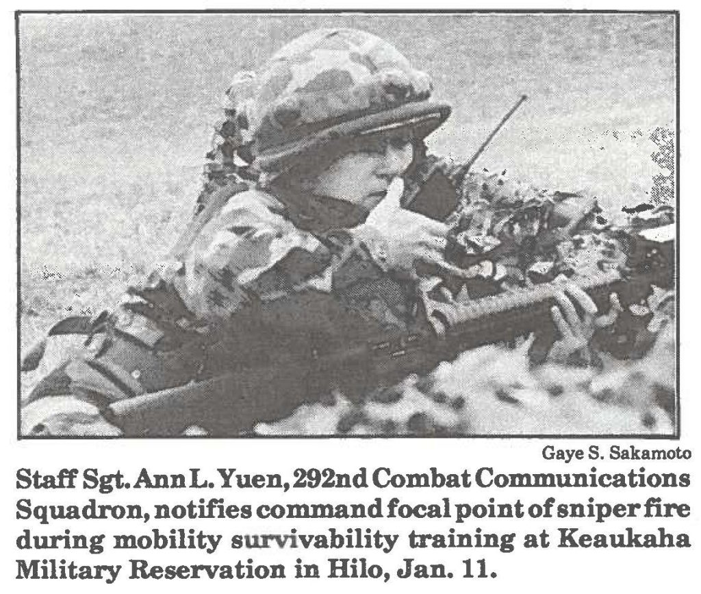 Staff Sgt. Ann L. Yuen, 292nd Combat Communications Squadron, notifies command focal point of sniper fire during mobility survivability training at Keaukaha Military Reservation in Hilo, Jan. 11.