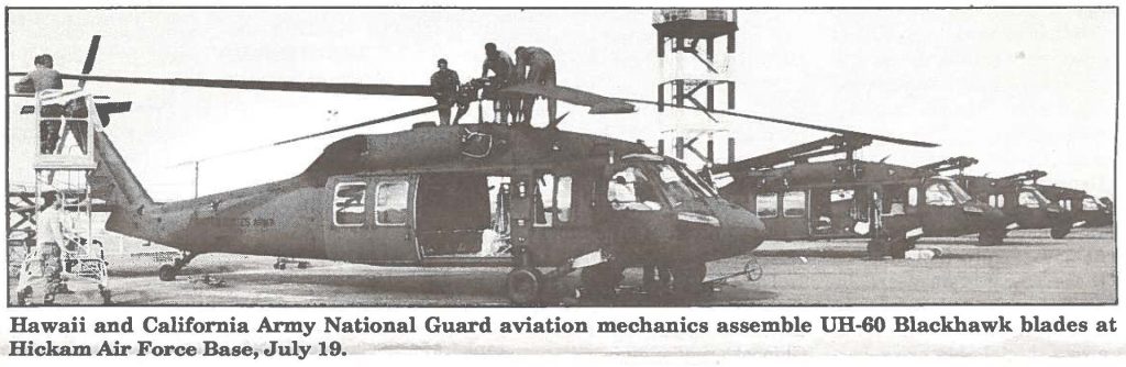 Hawaii and California Army National Guard aviation mechanics assemble UH-60 Blackhawk blades at Hickam Air Force Base, July 19.