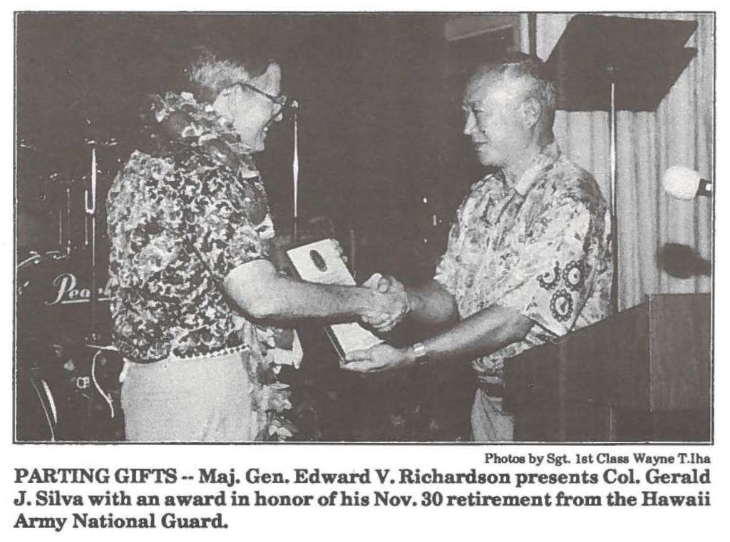 PARTING GIFTS - Maj. Gen. Edward V. Richardson presents Col. Gerald J. Silva with an award in honor of his Nov. 30 retirement from the Hawaii Army National Guard.