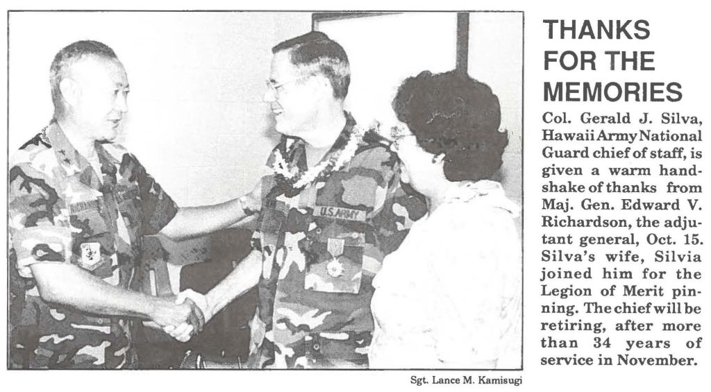 Col. Gerald J. Silva, Hawaii Army National Guard chief of staff, is given a warm handshake of thanks from Maj. Gen. Edward V. Richardson, the adjutant general, Oct. 15. Silva's wife, Silvia joined him for the Legion of Merit pinning. The chief will be retiring, after more than 34 years of service in November.