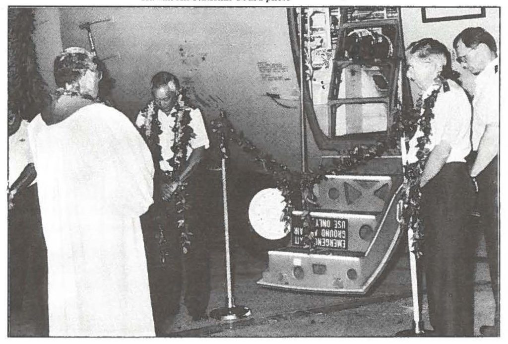 BLESSING OUR NEW BIRD - -(Left to right) Lt. Col. Edwin Miyahira; Maj. Gen. Edward V. Richardson, state adjutant general; Brig. Gen. David M. Rodrigues, Hawaii Air National Guard commander; and Col. Michael H. Tice, 154th Group commander, bow their heads as the Rev. Kaupu, of Kamehameha Schools, blesses the HIANGs new C-130H-3 Hercules transport, Sept.11.