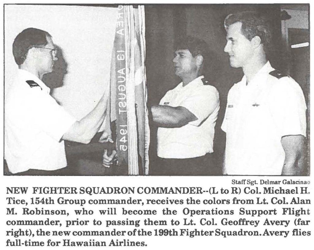 NEW FIGHTER SQUADRON COMMANDER--(L to R) Col. Michael H. Tice, 154th Group commander, receives the colors from Lt. Col. Alan M. Robinson, who will become the Operations Support Flight commander, prior to passing them to Lt. Col. Geoffrey Avery (far right), the new commander of the 199th Fighter Squadron. Avery flies full-time for Hawaiian Airlines.