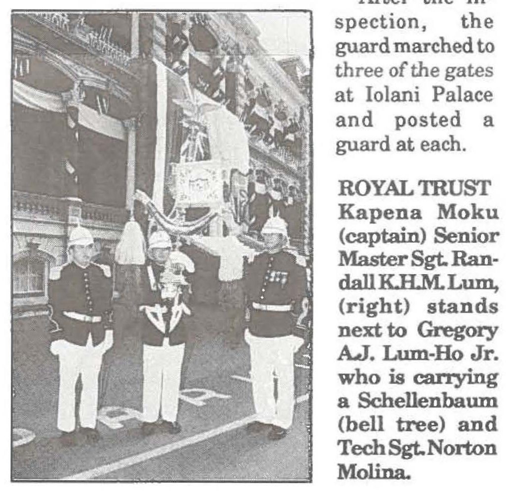 ROYAL TRUST Kapena Moku (captain) Senior Master Sgt. Randall K.H.M. Lum, (right) stands next to Gregory A.J. Lum-Ho Jr. who is carrying a Schellenbaum (bell tree) and Tech Sgt. Norton Molina.