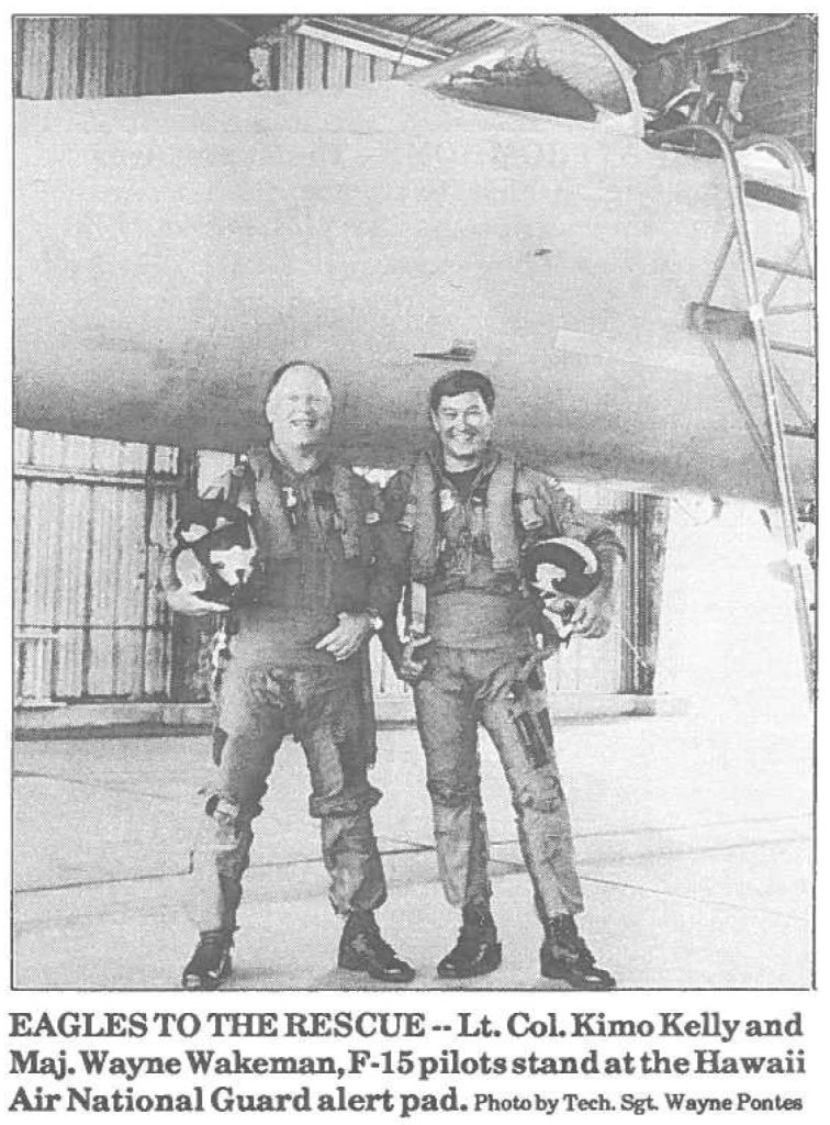 EAGLES TO THE RESCUE--Lt. Col Kimo Kelly and Maj. Wayne Wakeman, F-15 pilots stand at the Hawaii Air National Guard alert pad. Photo by Tech. Sgt. Wayne Pontes