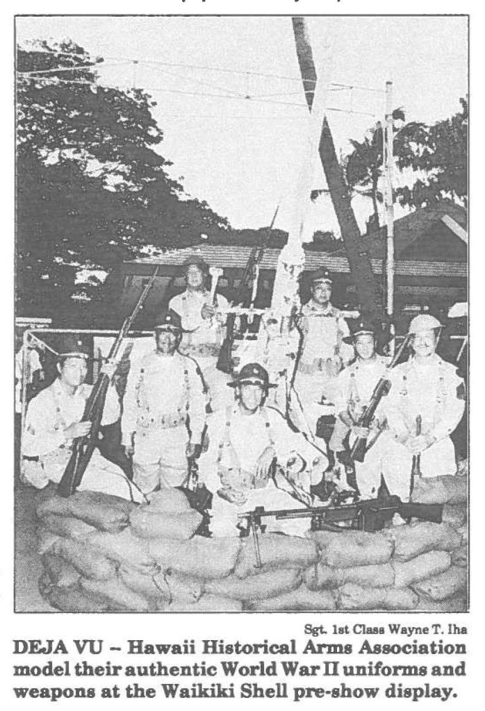 DEJA VU - Hawaii Historical Arms Association model their authentic World War Il uniforms and weapons at the Waikiki Shell pre-show display.