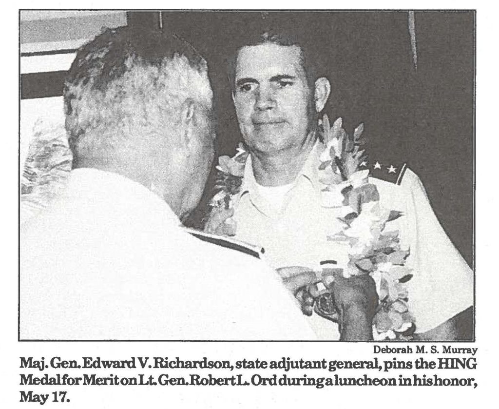 Maj. Gen. Edward V. Richardson, state adjutant general, pins the HING Medal for Merit on Lt. Gen. Robert L. Ord during a luncheon in his honor, May 17.
