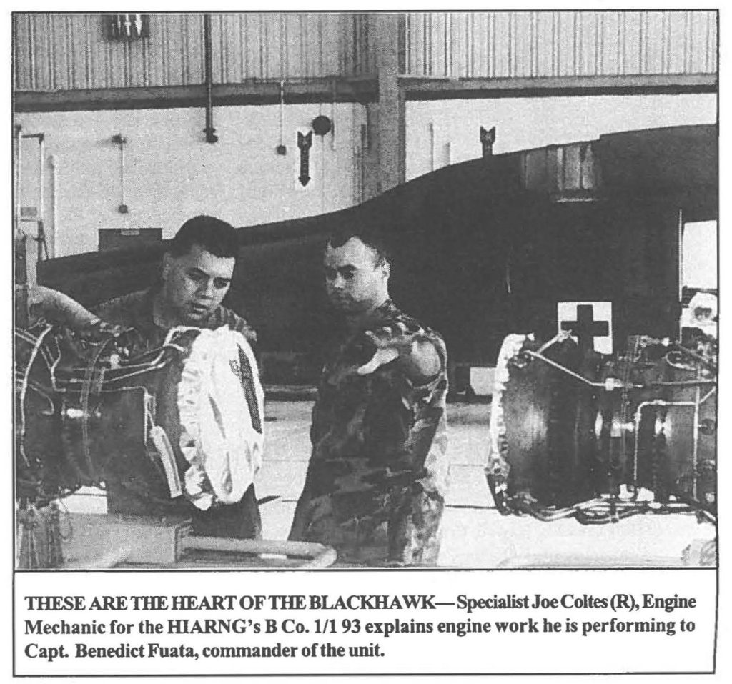 THESE ARE THE HEART OF THE BLACK HAWK-Specialist Joe Coltes(R), Engine Mechanic for the HIARNG's B Co. 1/1 93 explains engine work he is performing to Capt. Benedict Fuata, commander of the unit.