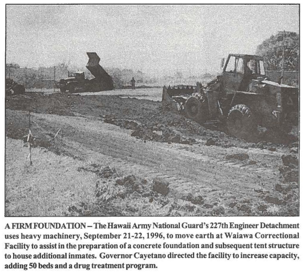 A FIRM FOUNDATION - The Hawaii Army National Guard's 227th Engineer Detachment uses heavy machinery, September 21-22, 1996, to move earth at Waiawa Correctional Facility to assist in the preparation of a concrete foundation and subsequent tent structure to house additional inmates. Governor Cayetano directed the facility to increase capacity, adding SO beds and a drug treatment program.