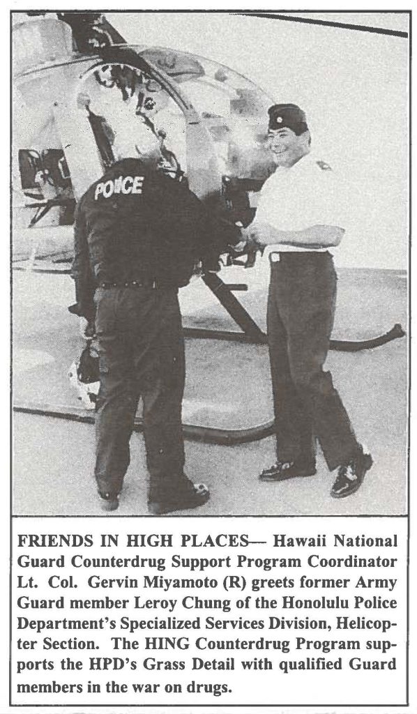 FRIENDS IN HIGH PLACES- Hawaii National Guard Counterdrug Support Program Coordinator Lt. Col. Gervin Miyamoto (R) greets former Army Guard member Leroy Chung of the Honolulu Police Department's Specialized Services Division, Helicopter Section. The HING Counterdrug Program supports the HPD's Grass Detail with qualified Guard members in the war on drugs.
