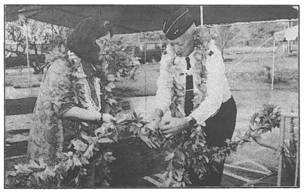 LOCAL TRADITlONS - Maj. Gen. Edward V. Richardson, the adjutant general and Mrs.Jennifer Goto Sabaa untie the maile lei symbolizing the official opening of the new Molokai Armory, Jan. 7. - Photo by Sgt. Lance M. Kamioei