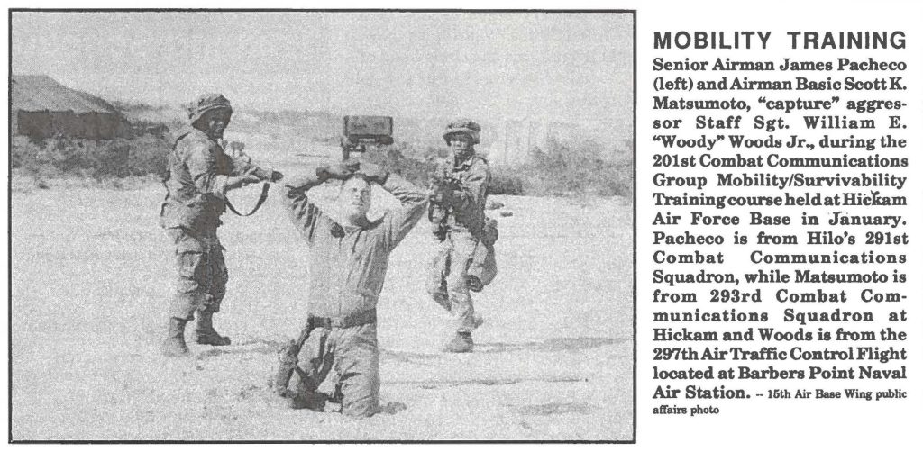 Senior Airman James Pacheco (left) and Airman Basic ScottK. Matsumoto, "capture" aggressor Staff Sgt. William E. "Woody" Woods Jr., during the 201st Combat Communications Group Mobility/Survivability Training course held at Hickam Air Force Base in January. Pacheco is from Hilo's 291st Combat Communications Squadron, while Matsumoto is from 293rd Combat Communications Squadron at Hickam and Woods is from the 297th Air Traffic Control Flight located at Barbers Point Naval Air Station. - 15th Air Base Wing public affairs photo