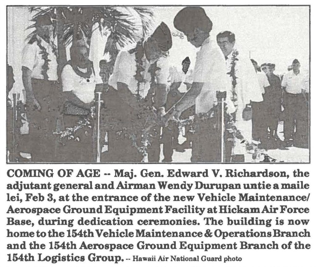COMING OF AGE -- Maj. Gen. Edward V. Richardson, the adjutant general and Airman Wendy Durupan untie a maile lei, Feb 3, at the entrance of the new Vehicle Maintenance/ Aerospace Ground Equipment Facility at Hickam Air Force Base, during dedication ceremonies. The building is now home to the 154th Vehicle Maintenance & Operations Branch and the 154th Aerospace Ground Equipment Branch of the 154th Logistics Group. -- Hawaii Air National Guard photo