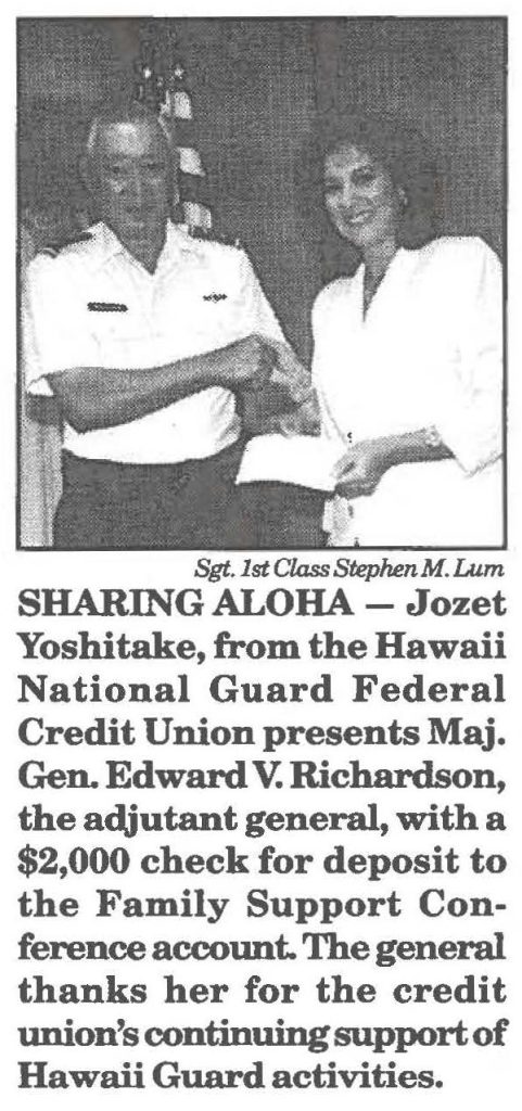 SHARING ALOHA - Jozet Yoshitake, from the Hawaii National Guard Federal Credit Union presents Maj. Gen. Edward V. Richardson, the adjutant general, with a $2,000 check for deposit to the Family Support Conference account. The general thanks her for the credit union's continuing support of Hawaii Guard activities.