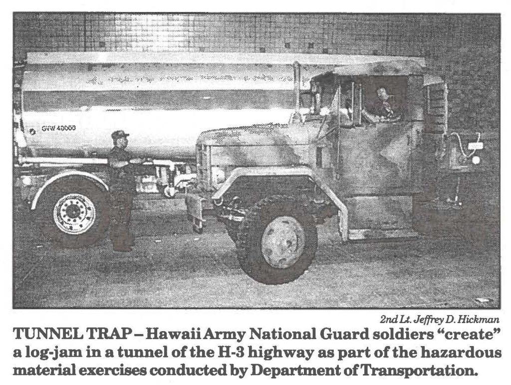TUNNEL TRAP-HawaiiArmy National Guard soldiers "create" a log-jam in a tunnel of the H-3 highway as part of the hazardous material exercises conducted by Department of Transportation.