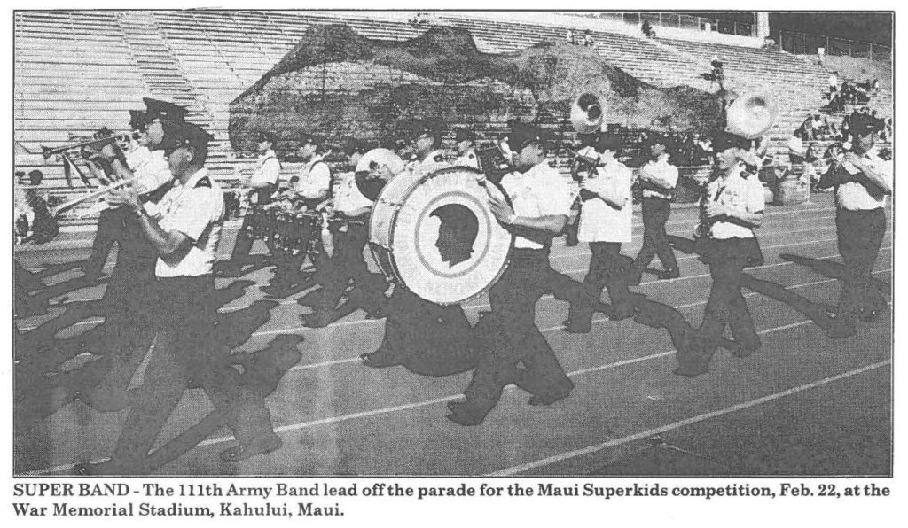 SUPER BAND -The 111th Army Band lead off the parade for the Maui Superkids competition, Feb. 22, at the War Memorial Stadium, Kahului, Maui.