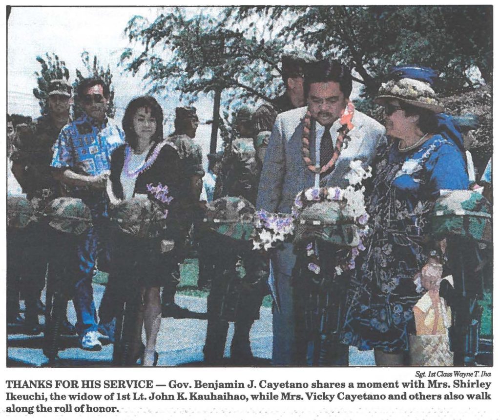 THANKS FOR HIS SERVICE - Gov. Benjamin J. Cayetano shares a moment with Mrs. Shirley Ikeuchi, the widow of 1st Lt. John K. Kauhaihao, while Mrs. Vicky Cayetano and others also walk along the roll of honor.