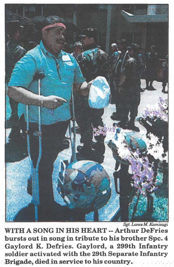 WITH A SONG IN HIS HEART -- Arthur DeFries bursts out in song in tribute to his brother Spc. 4 Gaylord K. Defries. Gaylord, a 299th Infantry soldier activated with the 29th Separate Infantry Brigade, died in service to his country.