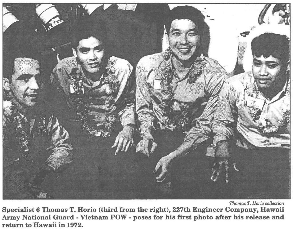 Specialist 6 Thomas T. Horio (third from the right), 227th Engineer Company, Hawaii Army National Guard - Vietnam POW - poses for his first photo after his release and return to Hawaii in 1972.