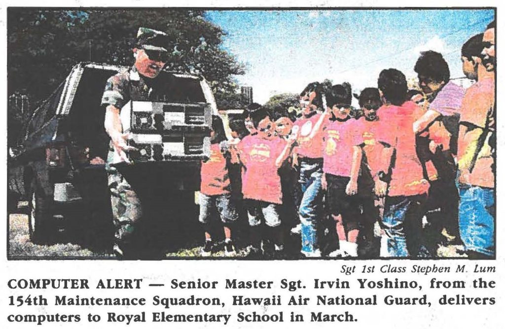 COMPUTER ALERT - Senior Master Sgt. Irvin Yoshino, from the 154th Maintenance Squadron, Haw,n Air National Guard, delivers computers to Royal Elementary School in March.