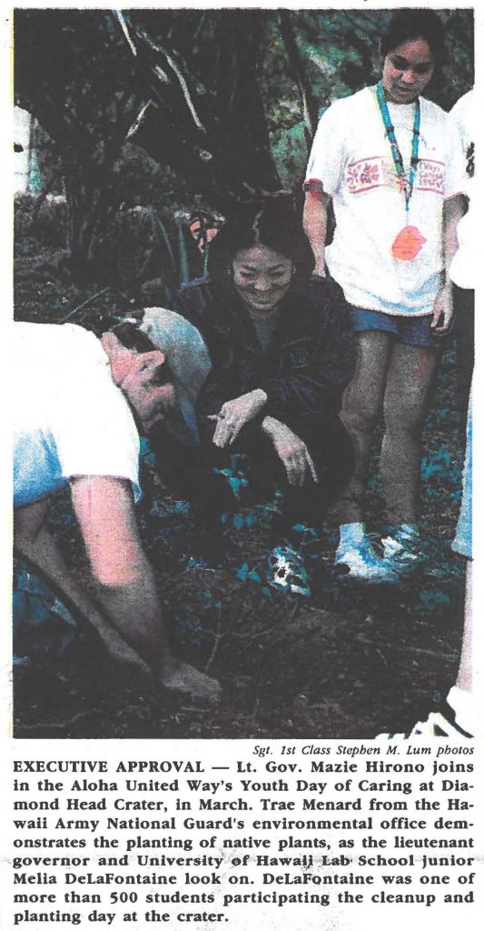 EXECUTIVE APPROVAL - Lt. Gov. Mazie Hirono joins in the Aloha United Way's Youth Day of Caring at Diamond Head Crater, in March. Trae Menard from the Hawaii Army National Guard's environmental office demonstrates the planting of. native plants, as the lieutenant governor and University of Hawaii Lab School junior Melia DeLaFontaine look on. DeLaFontaine was one of more than 500 students participating the cleanup and planting day at the crater.