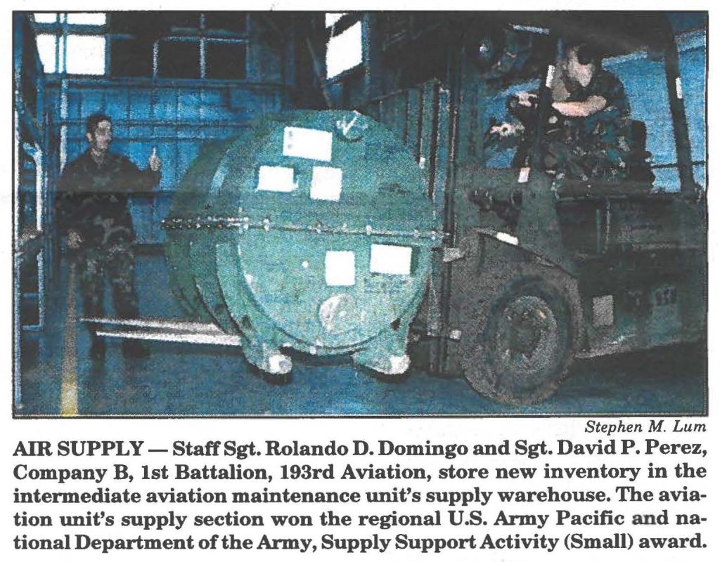 AIR SUPPLY - Staff Sgt. Rolando D. Domingo and Sgt. David P. Perez, Company B, 1st Battalion, 193rd Aviation, store new inventory in the intermediate aviation maintenance unit's supply warehouse. The aviation unit's supply section won the regional U.S. Army Pacific and national Department of the Army, Supply Support Activity (Small) award.