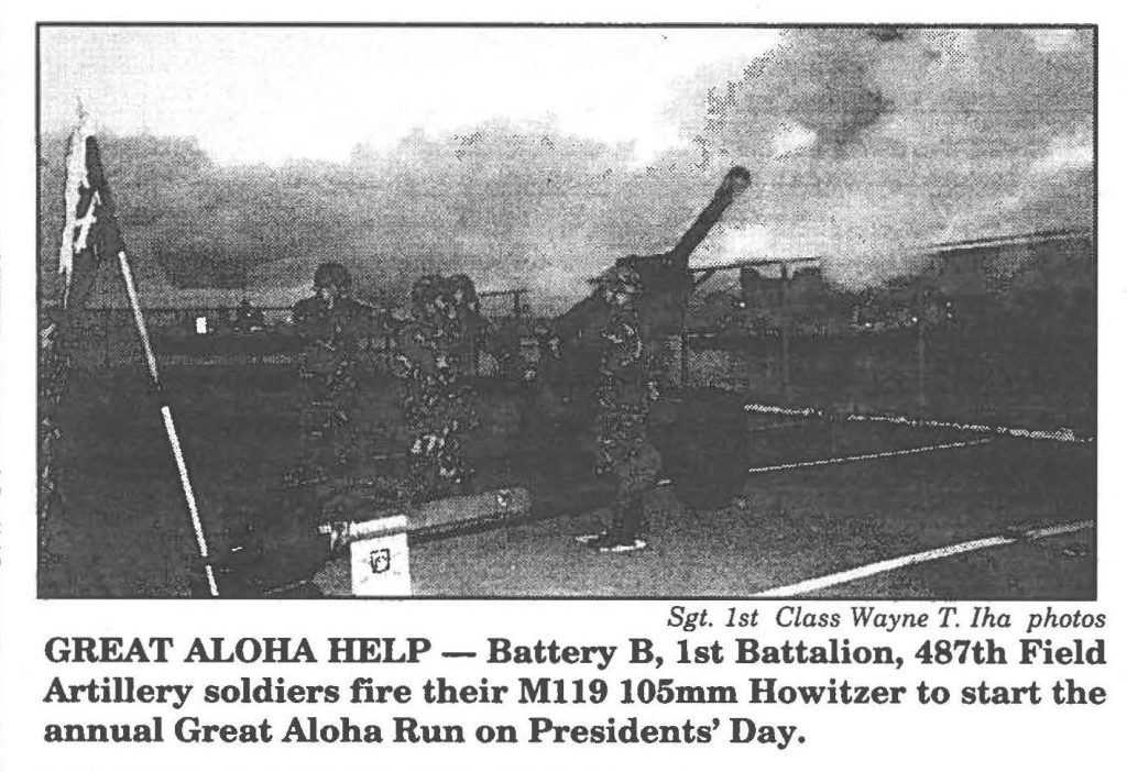 GREAT ALOHA HELP - Battery B, 1st Battalion, 487th Field Artillery soldiers fire their M119 105mm Howitzer to start the annual Great Aloha Run on Presidents' Day.