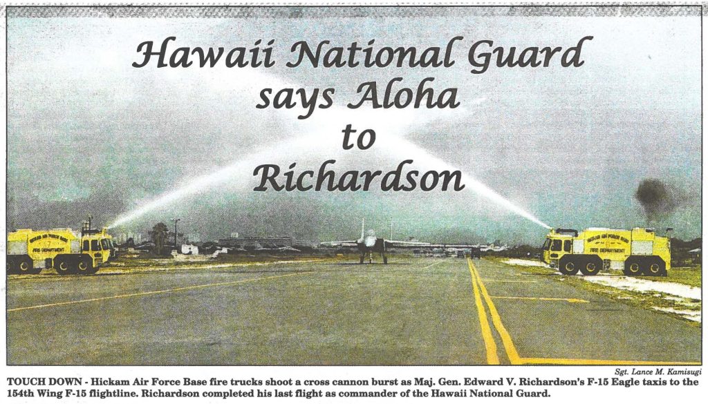 TOUCH DOWN - Hickam Air Force Base fire trucks shoot a cross cannon burst as Maj. Gen. Edward V. Richardson's F-15 Eagle taxis to the 154th Wing F-15 flightline. Richardson completed his last flight as commander of the Hawaii National Guard.