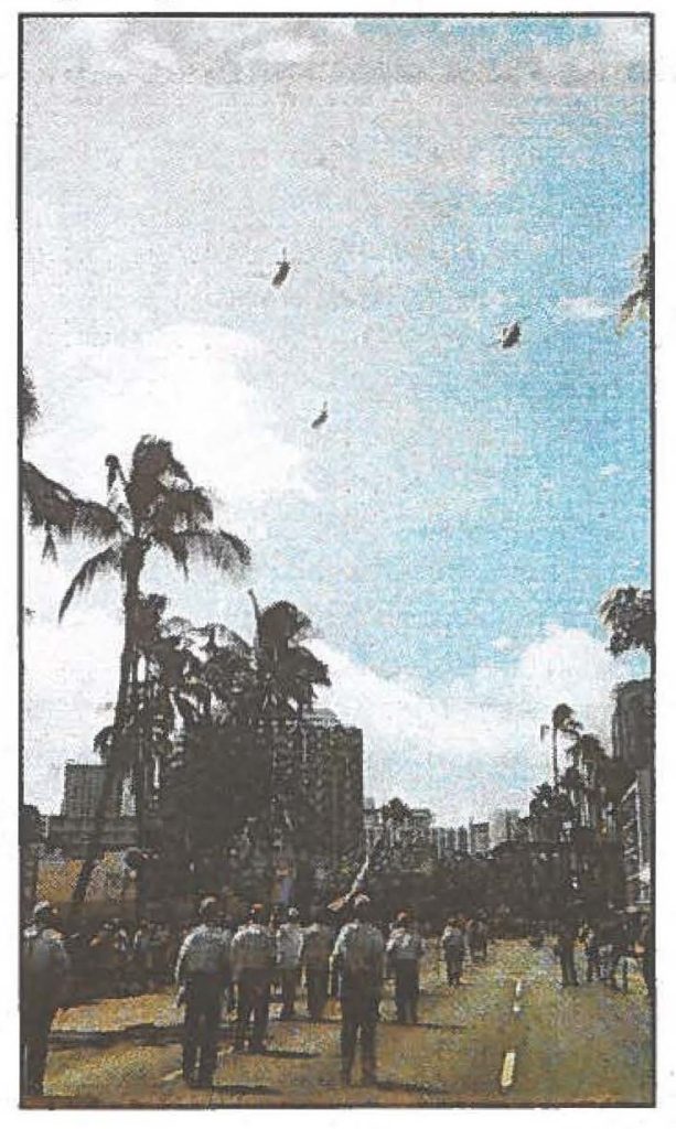 HAWAII GUARD SALUTES HAWAII'S MEDAL OF HONOR RECIPIENTS - three Ch-47D Chinook helicopters fly overhead during the parade in Waikiki.
