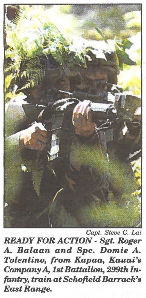 READY FOR ACTION - Sgt. Roger A. Balaan and Spc. Domie A. Tolentino, from Kapaa, Kauai's Company A, 1st Battalion, 299th Infantry, train at Schofield Barrack's East Range.