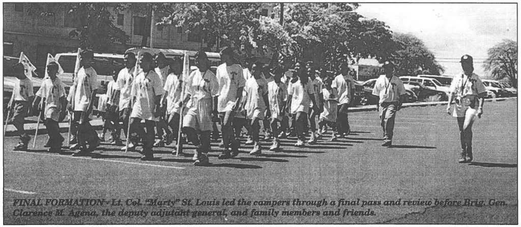 FINAL FORMATION - Lt. Col "Marty" St. Louis led the campers through a final pass and review before Brig. Gen. Clarence M. Gena, the deputy adjutant general, and family members and friends.