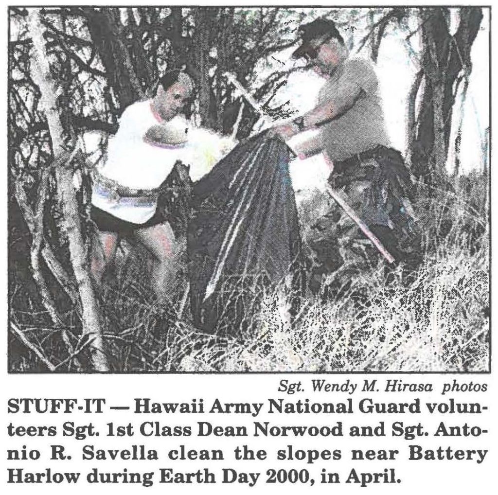STUFF-IT-Hawaii Army National Guard volunteers Sgt. 1st Class Dean Norwood and Sgt. Antonio R. Savella clean the slopes near Battery Harlow during Earth Day 2000, in April.