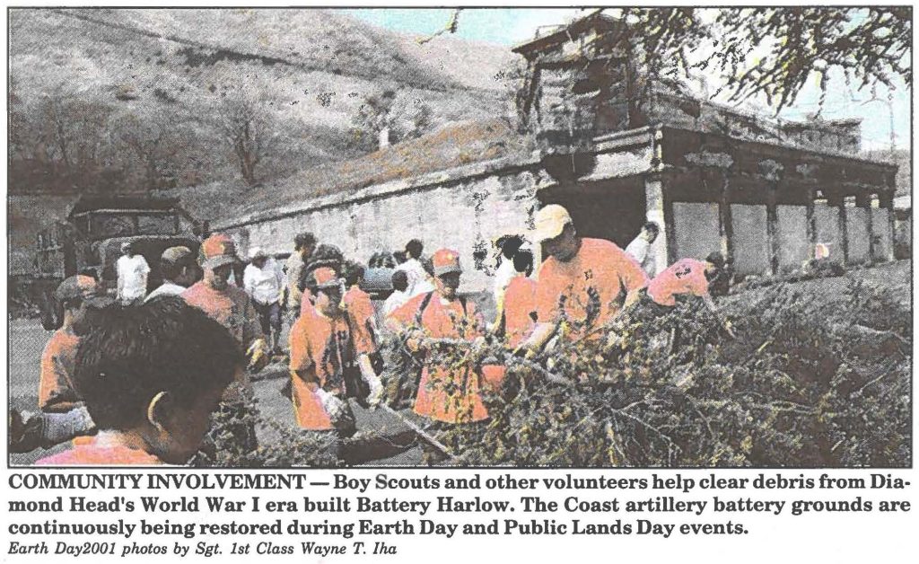 COMMUNITY INVOLVEMENT- Boy Scouts and other volunteers help clear debris from Diamond Head's World War I era built Battery Harlow. The Coast artillery battery grounds are continuously being restored during Earth Day and Public Lands Day events.