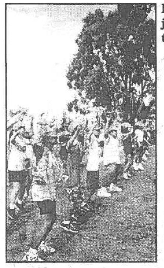 LOOSENING UP -Youth trainees do jumping jacks to warm up their muscle for the days activities.