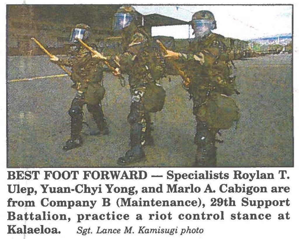 BEST FOOT FORWARD-Specialists Roylan T. Ulep, Yuan-Chyi Yong, and Marlo A. Cabigon are from Company B (Maintenance), 29th Support Battalion, practice a riot control stance at Kalaeloa. Sgt. Lance M. Kamisugi photo