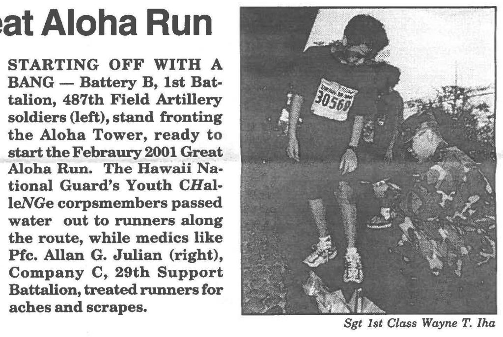 STARTING OFF WITH A BANG -The Hawaii National Guard's Youth CHalleNGe corpsmembers passed water out to runners along the route, while medics like Pfc. Allan G. Julian, Company C, 29th Support Battalion, treated runners for aches and scrapes.
