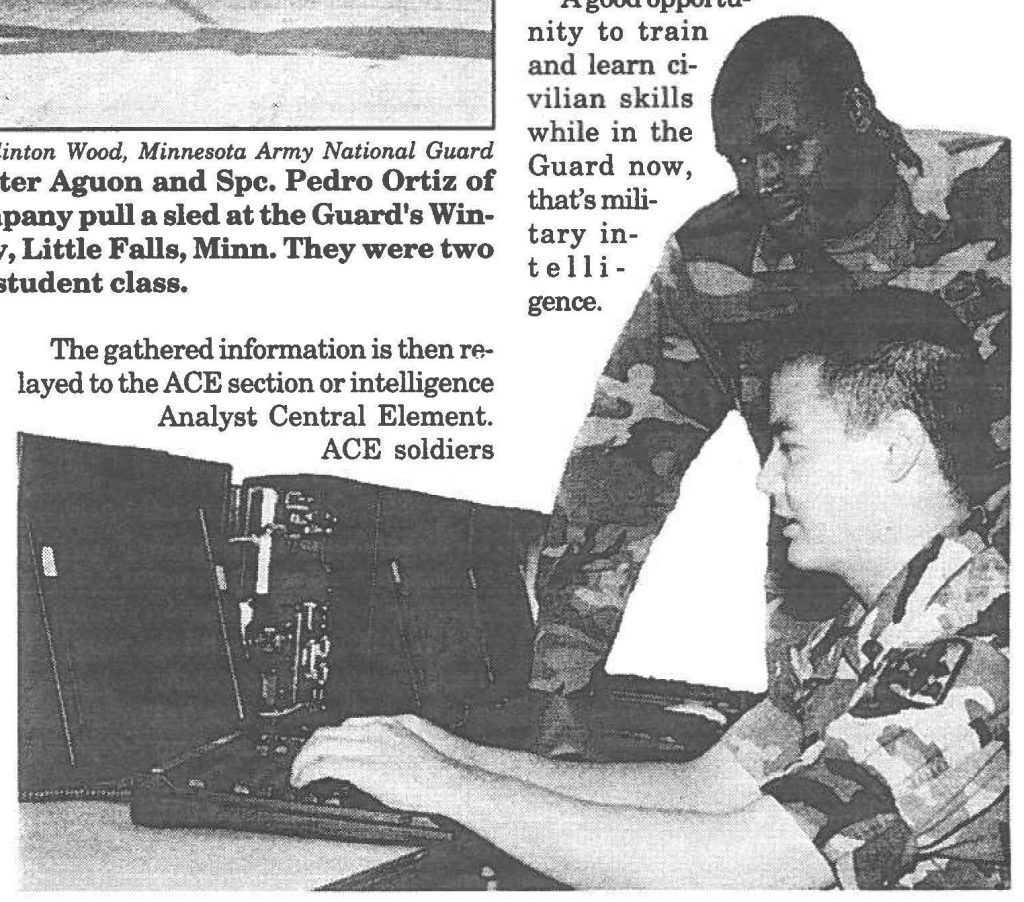 SPECIAL INTEL- Specialists Janal Jones (standing) and Rick Ishii,
from the 229th Military Intelligence Company, train on the WARLORD
notebook computer. The computer keeps the unit in sync with the
Army's newer intelligence gathering systems.