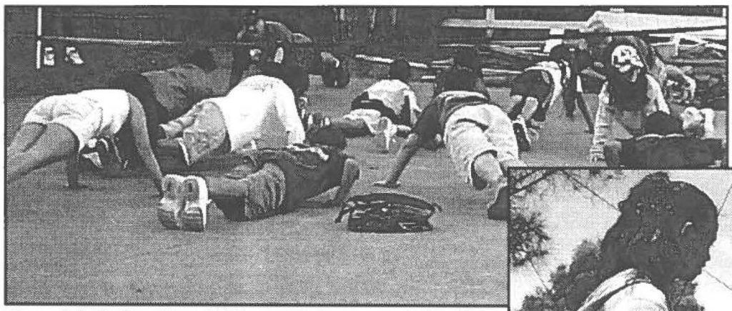 Adult leader Gilbert Nobrega (154ACS) leads "Echo Geckos" in squad push-ups.