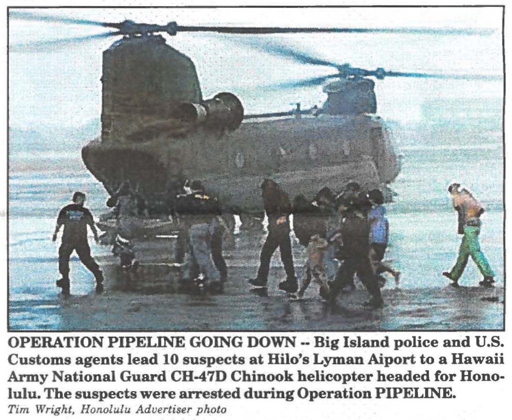OPERATION PIPELINE GOING DOWN -- Big Island police and U.S. Customs agents lead 10 suspects at Hilo's Lyman Aiport to a Hawaii Army National Guard CH-47D Chinook helicopter headed for Honolulu. The suspects were arrested during Operation PIPELINE. Tim Wright, Honolulu Advertiser photo
