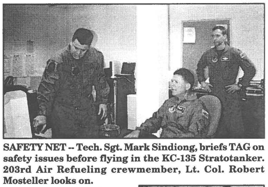 SAFETY NET--Tech. Sgt. Mark Sindiong, briefs TAG on safety issues before flying in the KC-135 Stratotanker. 203rd Air Refueling crewmember, Lt. Col. Robert Mosteller looks on.