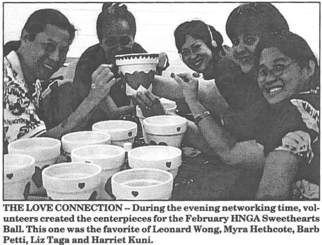 THE LOVE CONNECTION - During the evening networking time, volunteers created the centerpieces for the February HNGA Sweethearts Ball. This one was the favorite of Leonard Wong, Myra Hethcote, Barb Petti, Liz Taga and Harriet Kuni.
