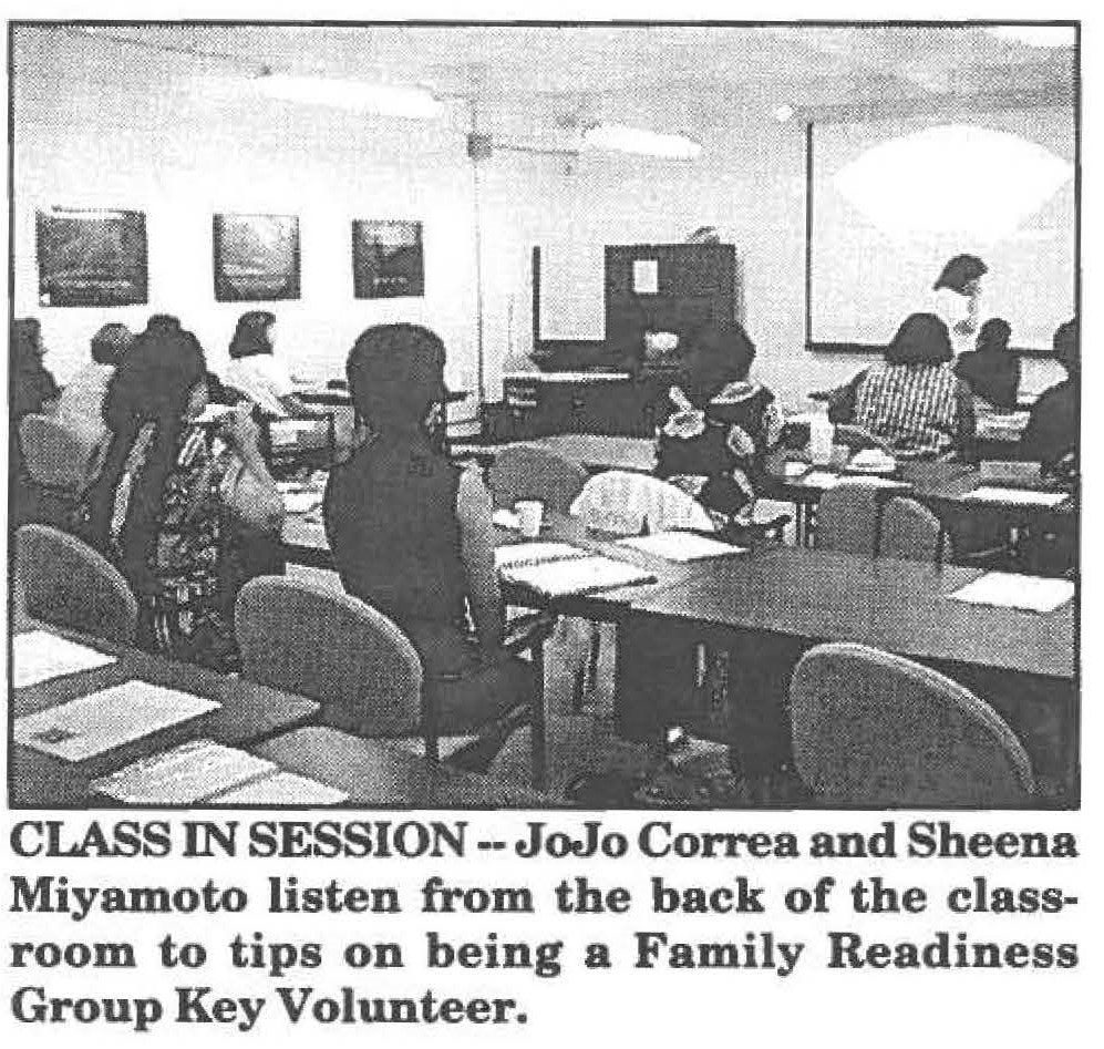 CLASS IN SESSION -- JoJo Correa and Sheena Miyamoto listen from the back of the classroom to tips on being a Family Readiness Group Key Volunteer.