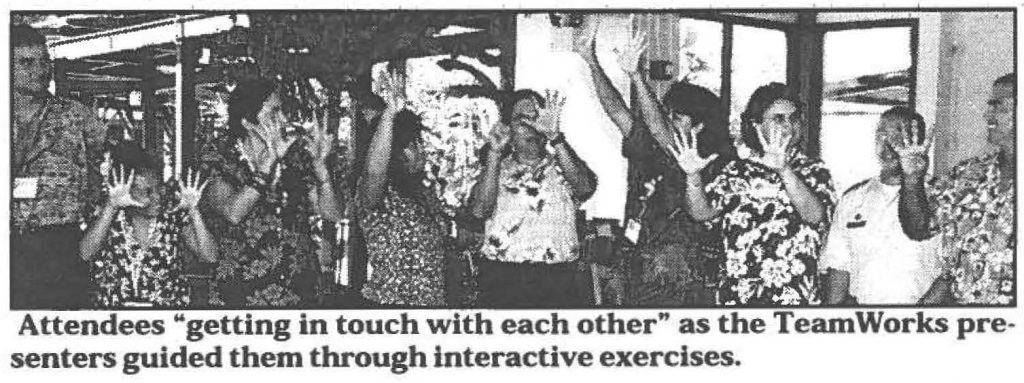 Attendees "getting in touch with each other" as the Team Works presenters guided them through interactive exercises.